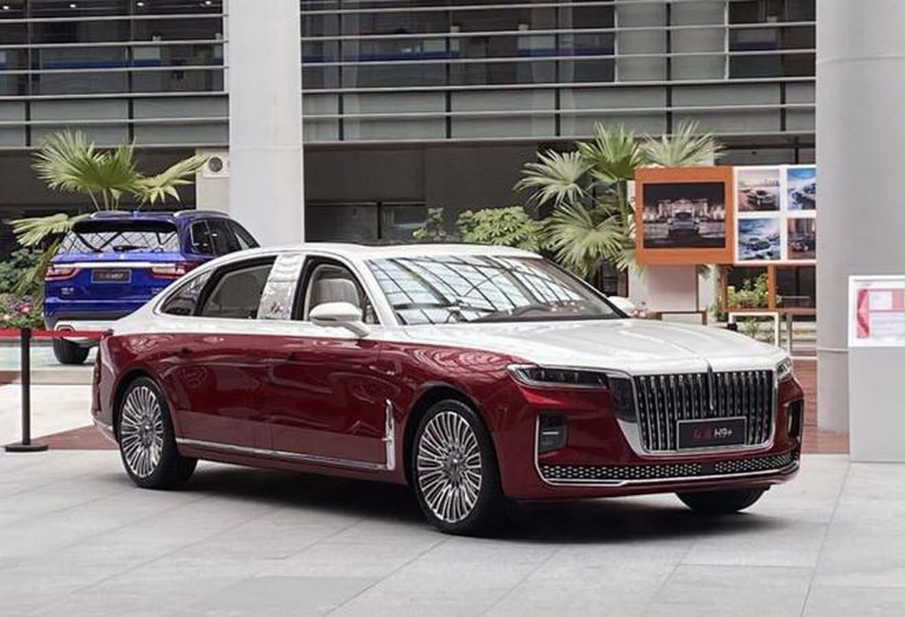 Luxury electric sedan on display in showroom